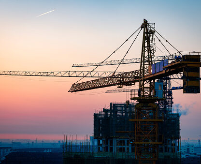 Construction site under sunset